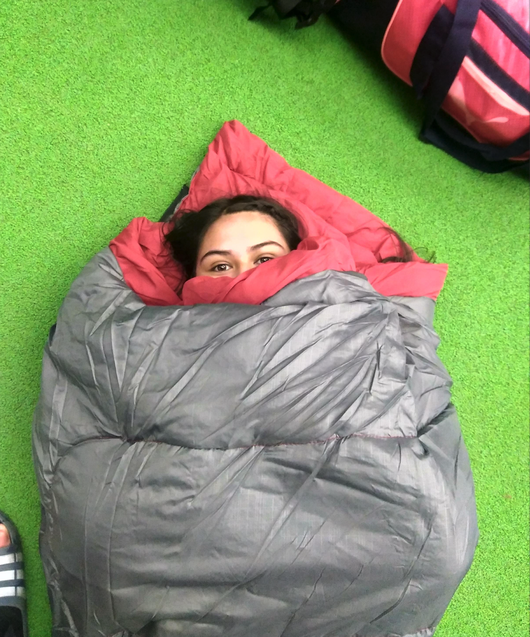 Staying cozy in a sleeping bag at orientation