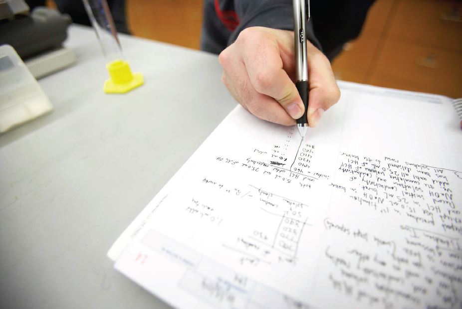Student handwriting an exam