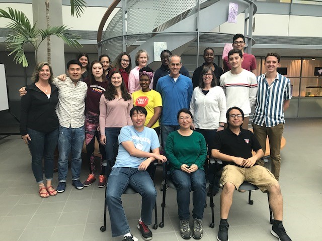 group photo of students in druckenmiller atrium