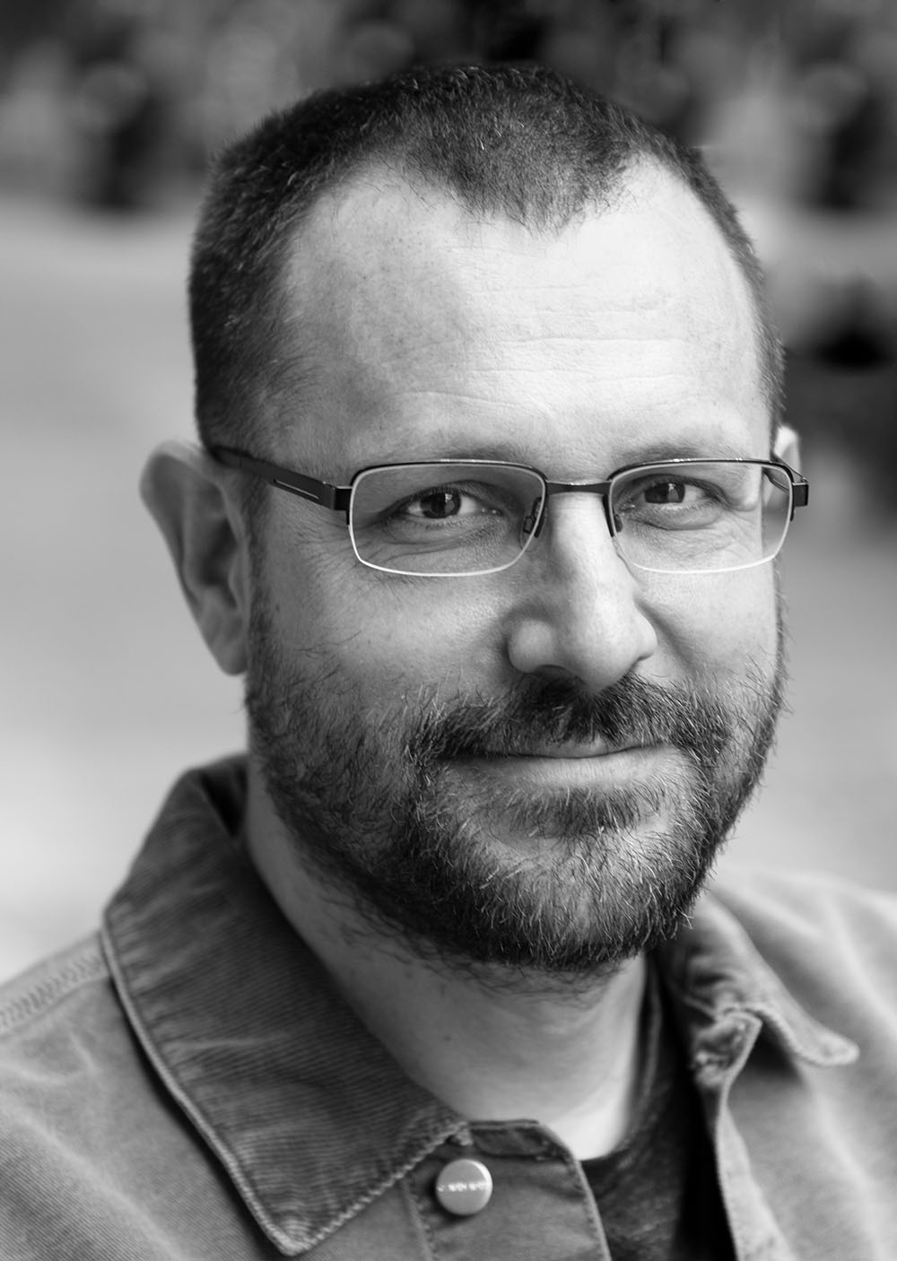 Black and white headshot of Jeremy Frey