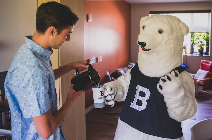 Polar Bear mascot sharing some tea
