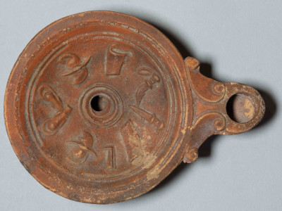 Unglazed Lamp with Gladiators in Relief