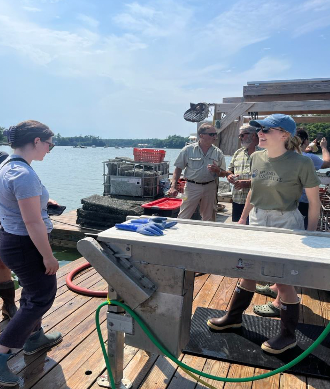 A group of people work on a dock.