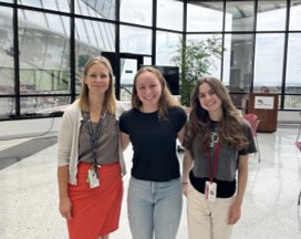 Annie poses with two coworkers at the hospital.