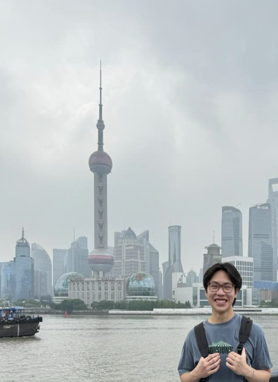 Conner poses in the city of Shanghai, where Orbit Startups is located. 