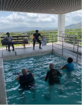 Daniel Isaacs exercising with clients