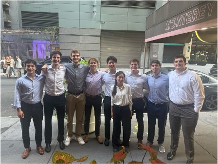 Ellie O'Dwyer standing for photo in large group