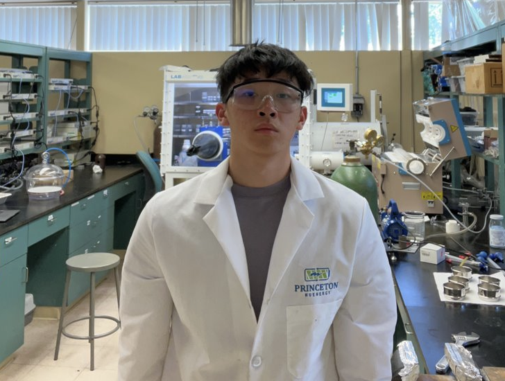Eric posing in front of laboratory space.