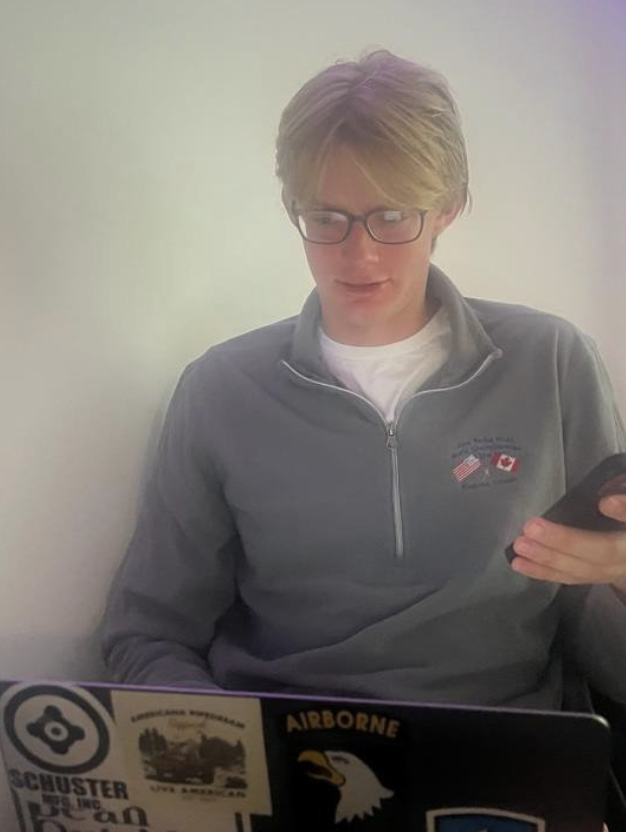 Ethan works on both the phone and laptop.