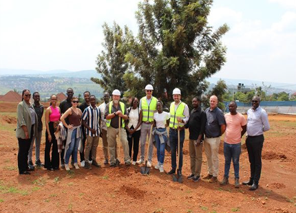 Gislaine Umuhoza standing with group in Sub-Saharan Africa