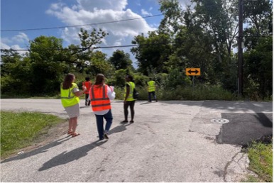 Group with safety vest walking