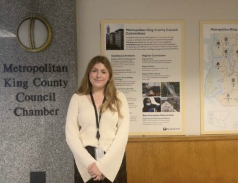 June poses in the Metropolitan King County Council Chamber