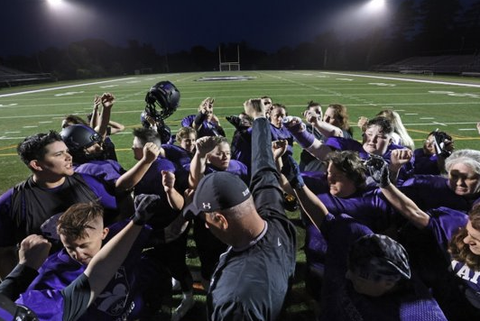 Picture taken from Marc's article; shows football team on field.