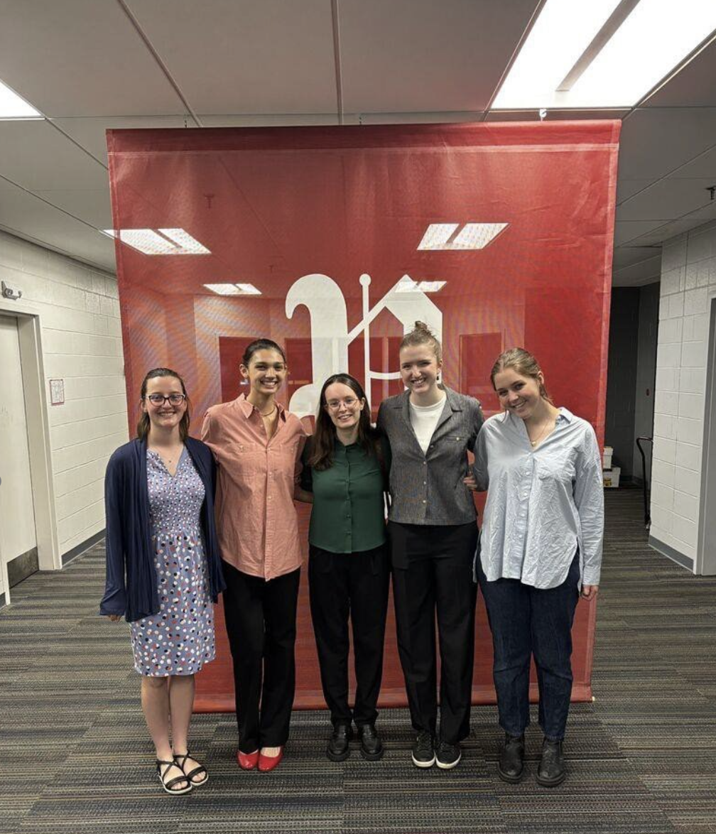 Sarah poses with other interns in front of the Portland Press Herald office.
