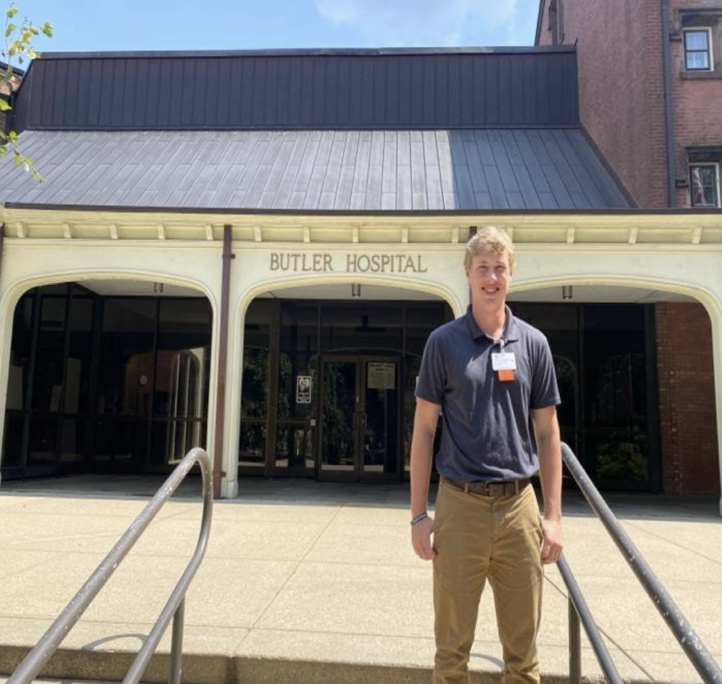 Zac poses in front of Butler Hospital.