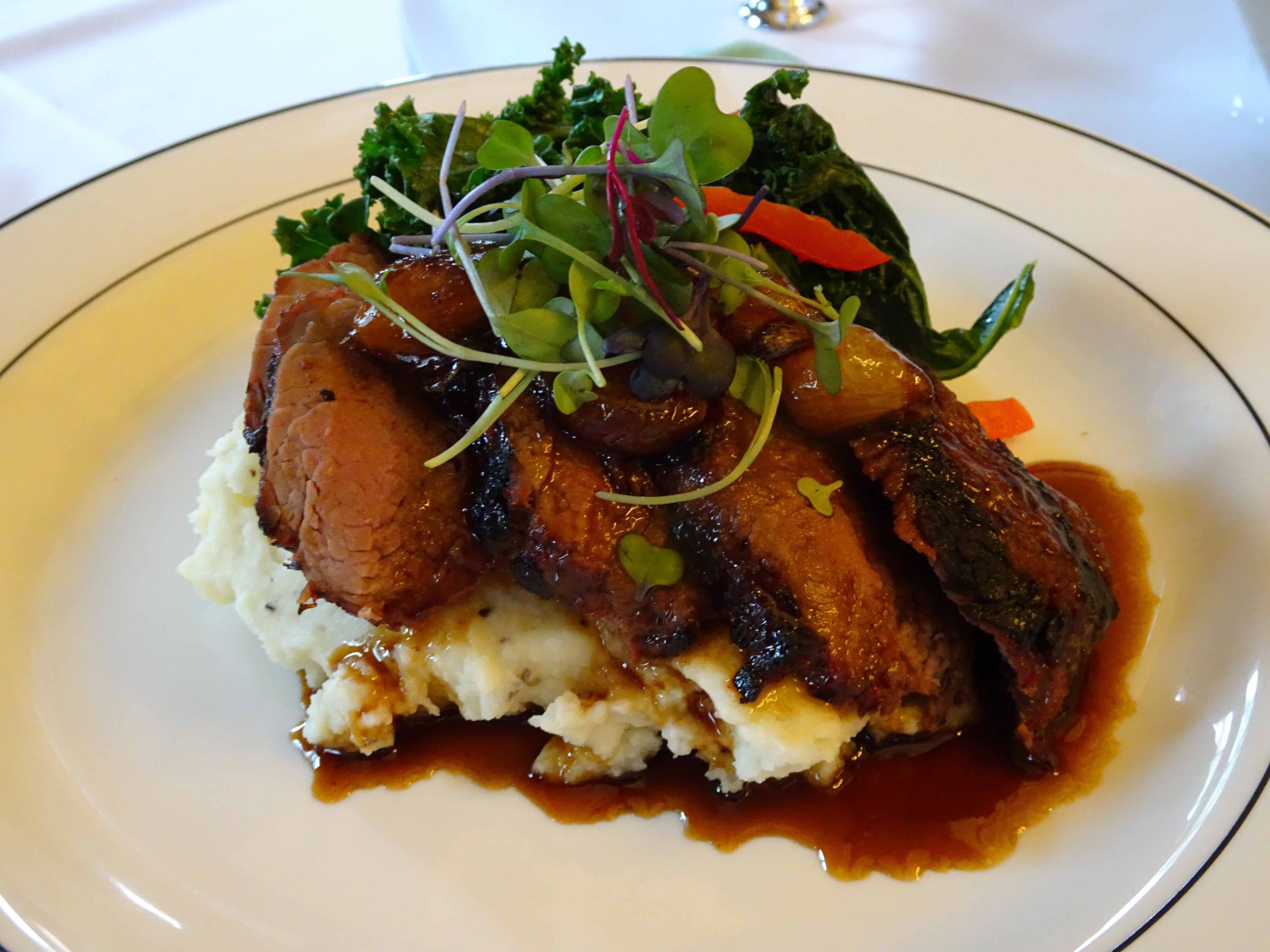 bistro steak on mashed potatoes