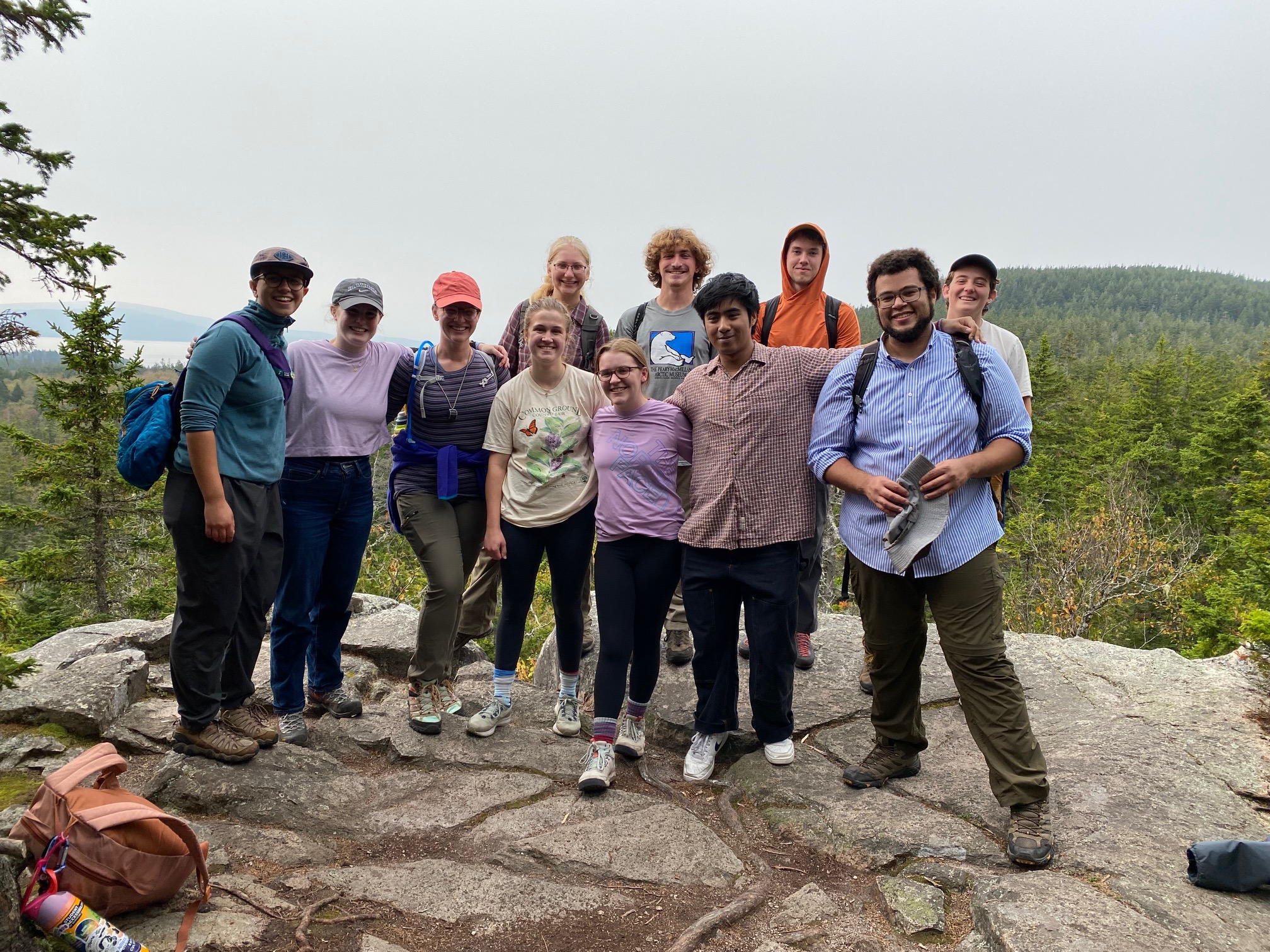 Students and faculty stop for a photo on their hike on the Schoodic Head Trail