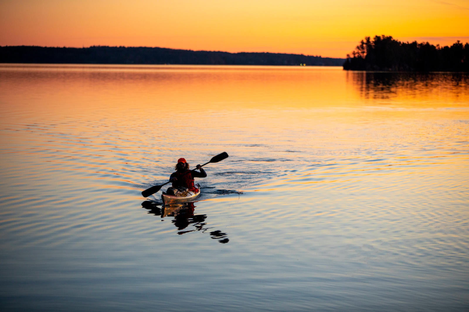 Kayaker at sunset