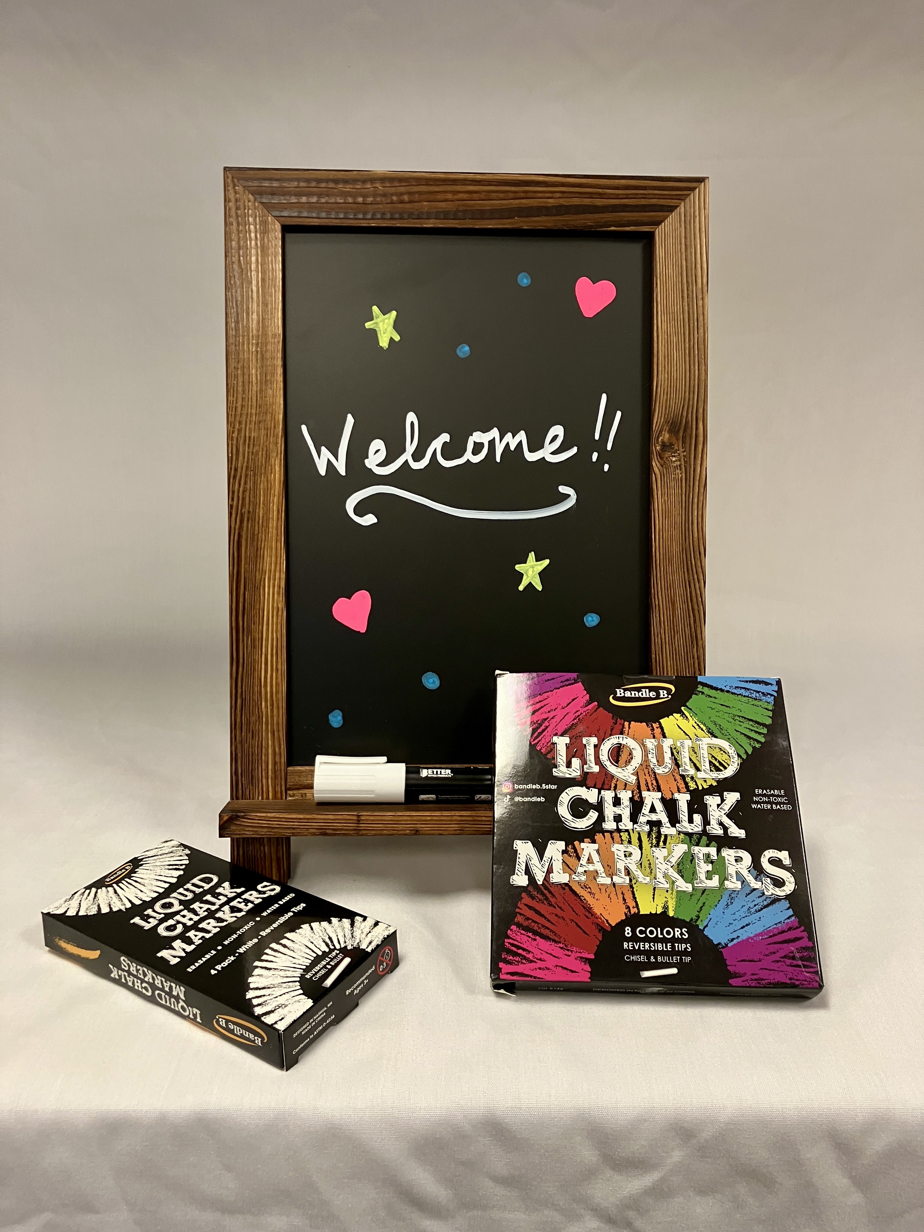 Image of small chalkboard easel and chalk markers