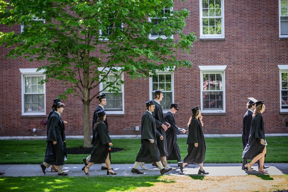 Graduates walking during commencement