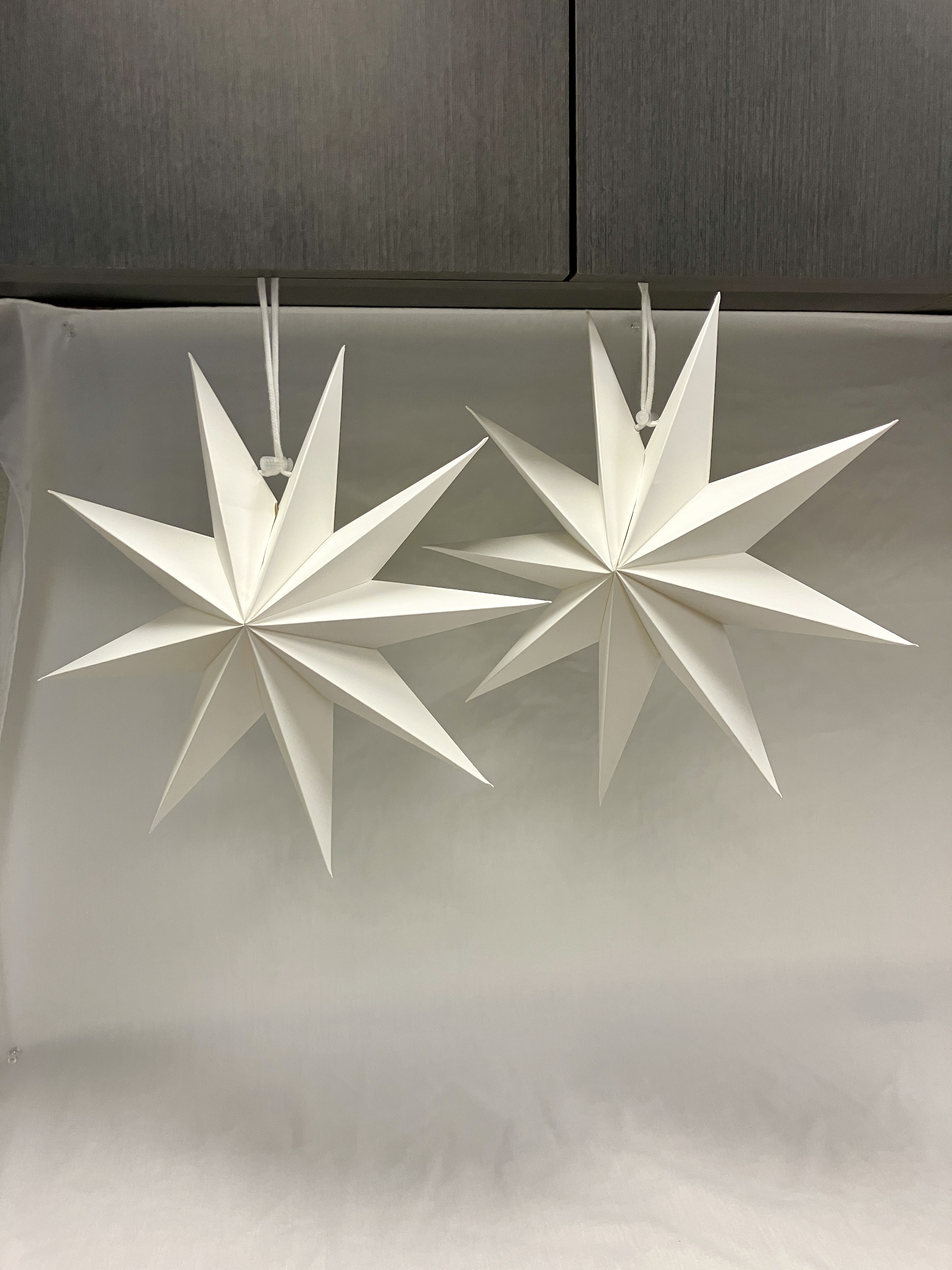 image of white paper star decorations