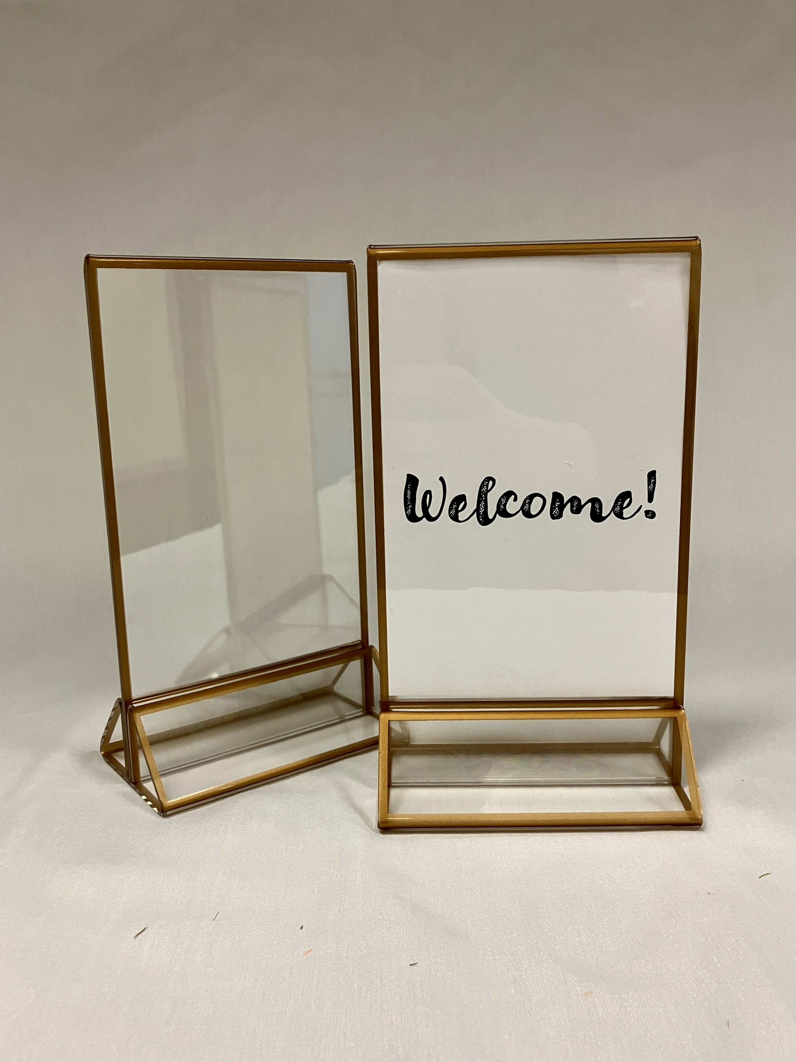 image of small sign holder with gold trim