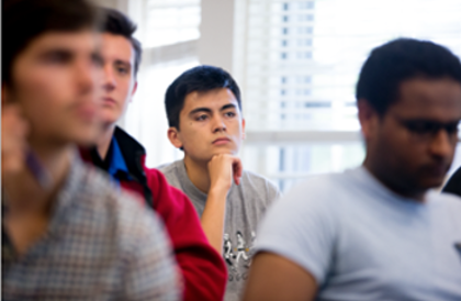 A Bowdoin student in class