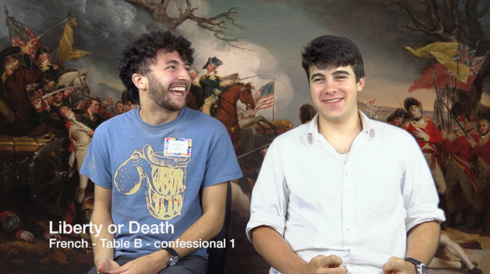 Students smile in front of revolutionary war painting