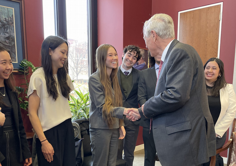 Ashley shaking Angus King's hand