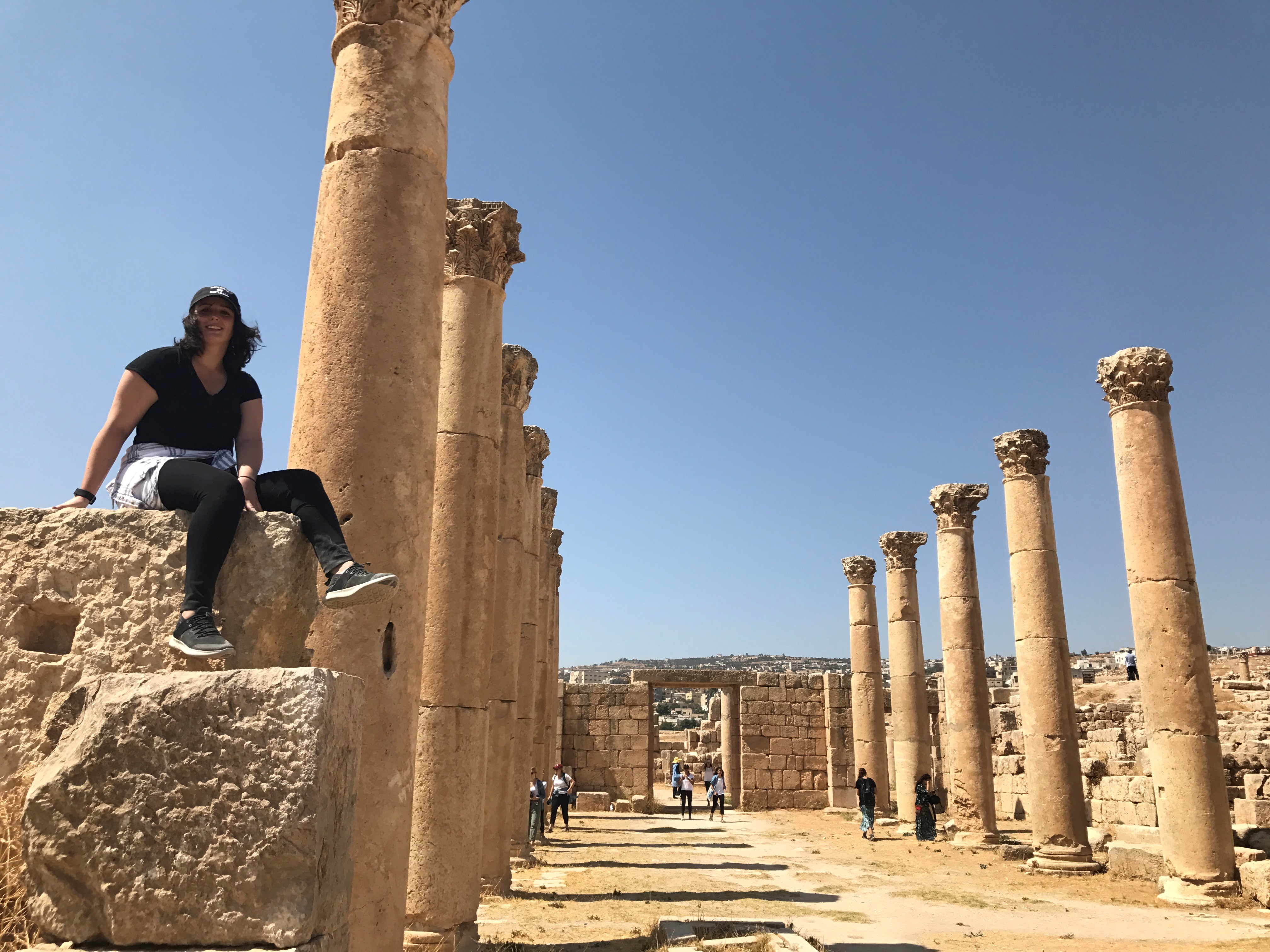 Student visiting ruins in Jordan