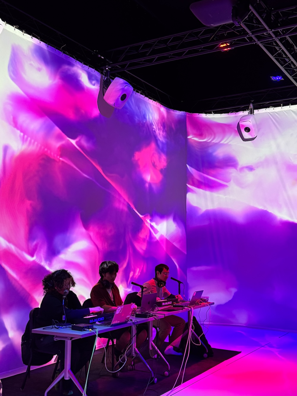 Electroacoustic ensemble performance with purple background