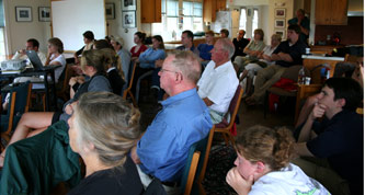 Faculty, neighbors and fellow research colleagues turn out for a presentation of ongoing research at the Coastal Studies Center.