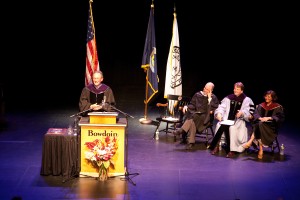 Mills at the podium during his speech