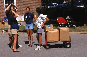 Res Life staff lend a helping hand by transporting boxes