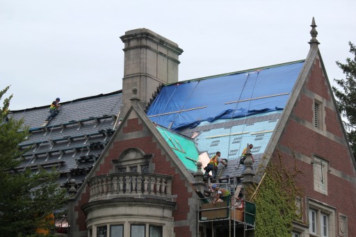 Workers redoing Hubbard Hall's roof
