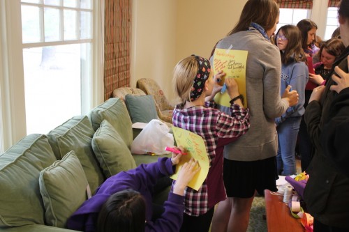 Female mentee writing note