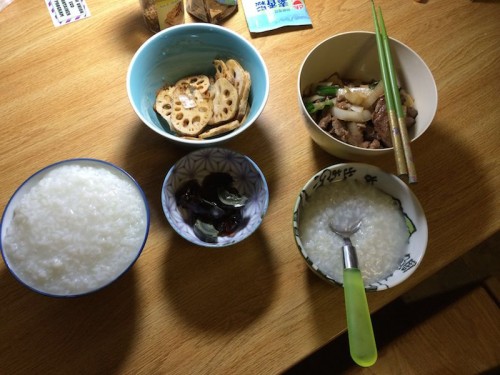 A “modest” dinner, including congee, fermented eggs, lotus roots, and bok choy stir-fry. Most of the ingredients are from Asian markets in Boston.