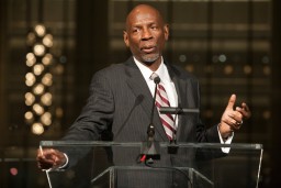 Cananda speaking at podium