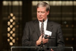 Druckenmiller speaking at podium