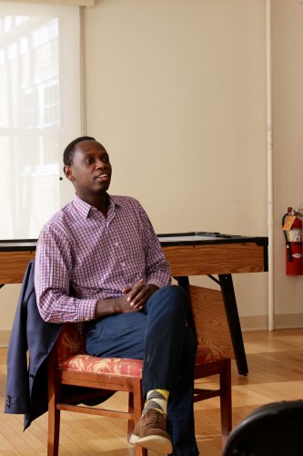 Prosper Ishimwe tells Bowdoin students about his experiences growing up in Rwanda