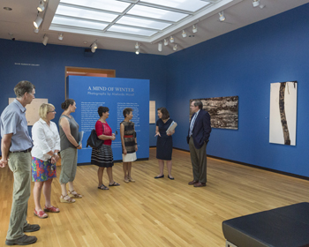 Anne Goodyear and Frank Goodyear, co-directors of the Bowdoin College Museum of Art, speaking with Jane Chu, Chairman of the National Endowment for the Arts and Julie Richard, Executive Director of the Maine Arts Commission in the Bowdoin College Museum of Art