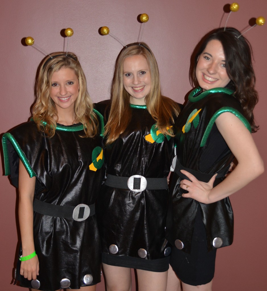 Three students dressed in sci-fi costumes