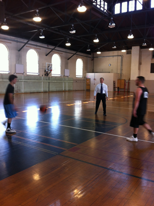 Former U.S. Secretary of Defense and 1962 All-State basketball player William S. Cohen ’62, H’75 shoots hoops in Sargent Gym in 2012.