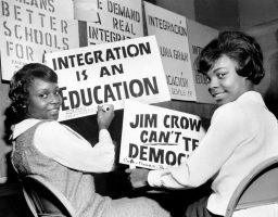 Two girls organizing a boycott protest against racial discrimination in NYC public schools in 1964.