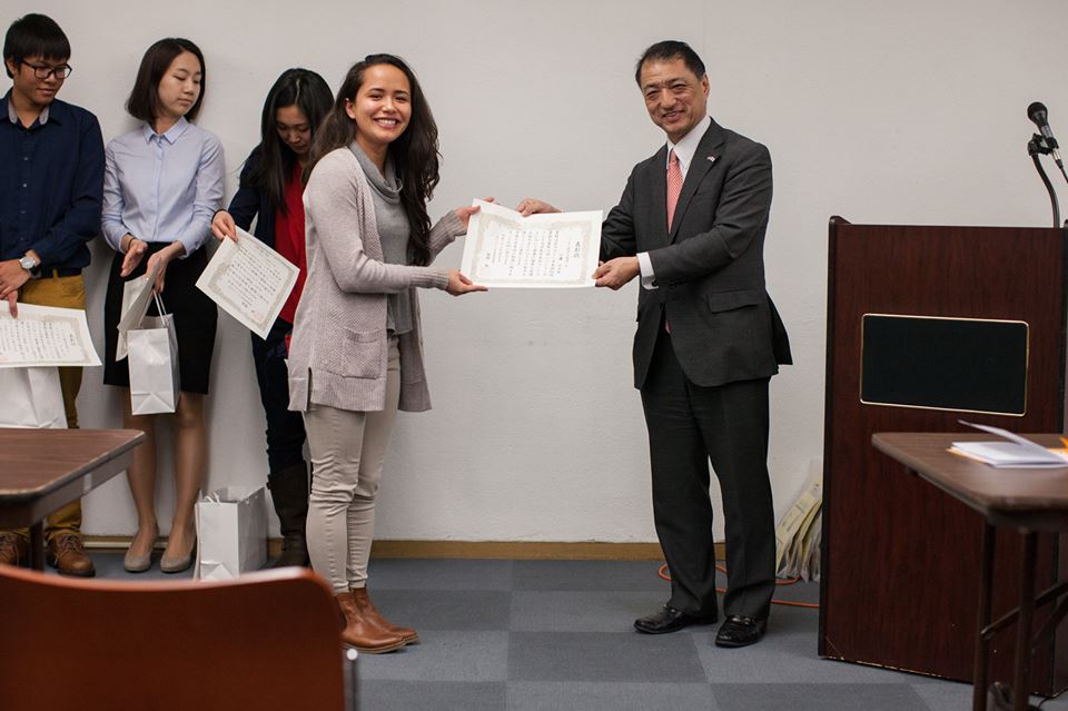 Melissa Miura receives her award from Japanese Consul General Tsutomu Himeno. Photo: Anna Aridome