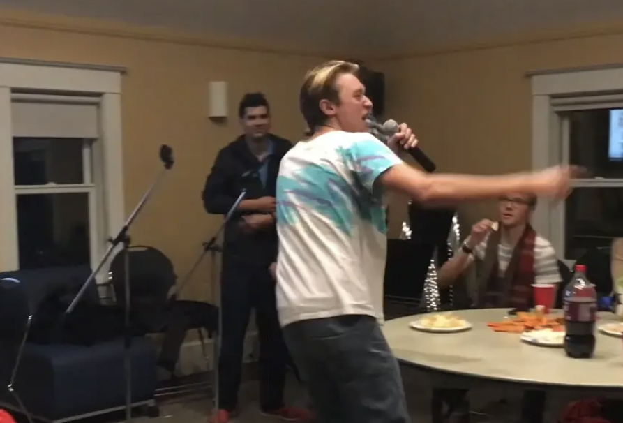 Student performing karaoke.