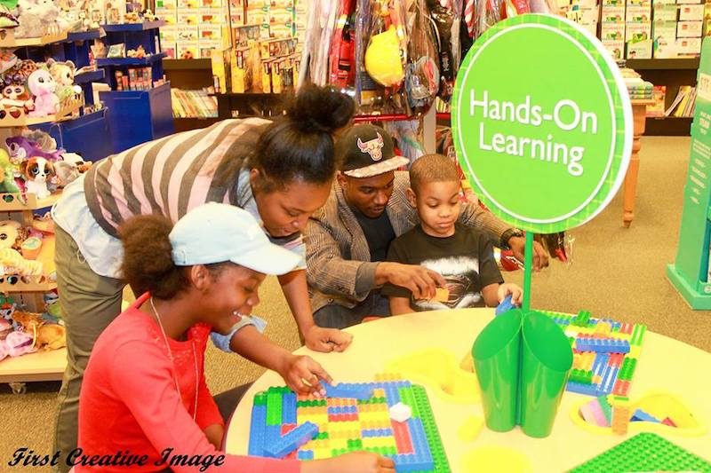 Lakia Hudson and Ty Johnson with campers