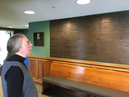 Noma Petroff studies Bowdoin’s Civil War plaques in Memorial Hall