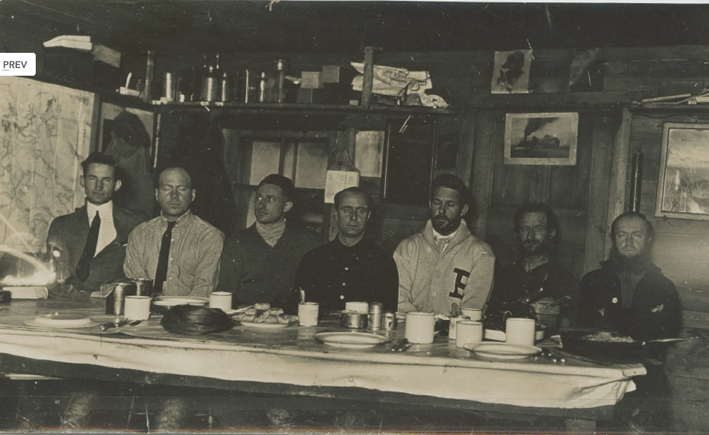 Men at dinner at Borup Lodge