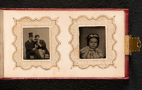 Tintype miniature family photo album, circa 1881. From the Rowland Bailey Howard Papers